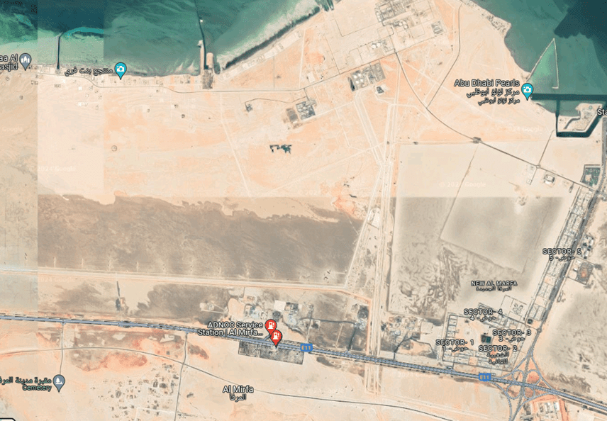 Al Marfa Oil and Gas petrol station complex project.  is a site view from Google showing the open space and building layout of the petrol station in the Al Marfa region.