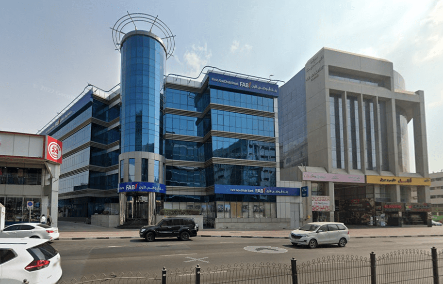 Al Khabeesi headquarters commercial and office building. Main Road photo of the project showing building and surroundings.