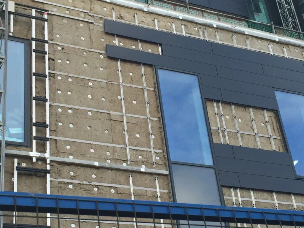 Architects / 12 site supervision steps: The consultant. complex material construction of façade in a multistory building.