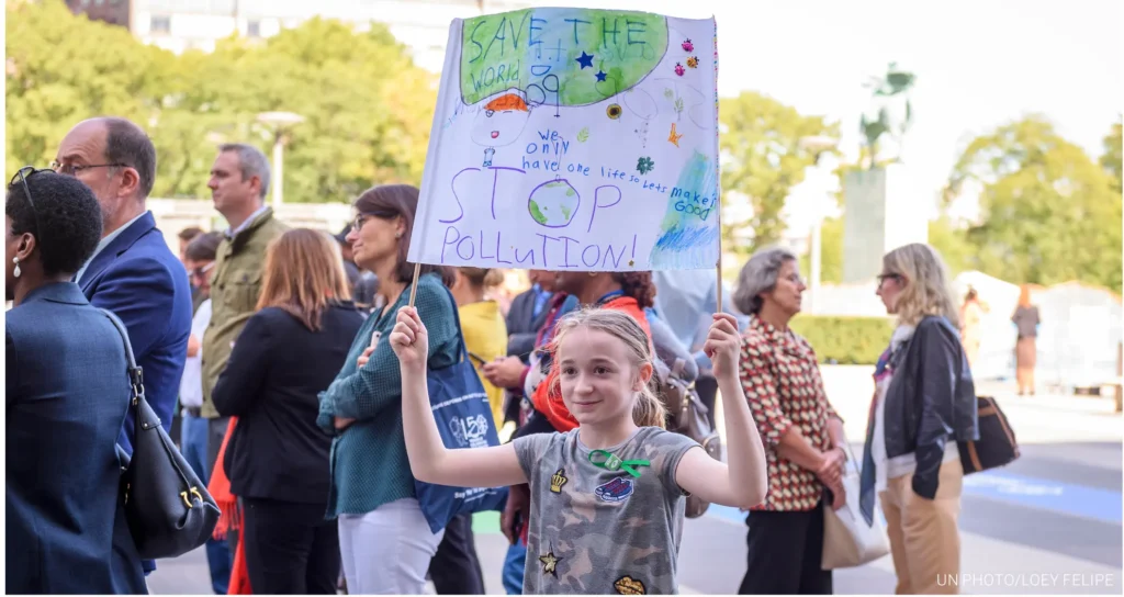 What is sustainable urban development? Community gathering to promote saving the planet and stop pollution.